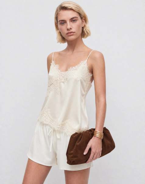 ASOS DESIGN – Knappe Laufshorts aus Satin in Elfenbein - view 1