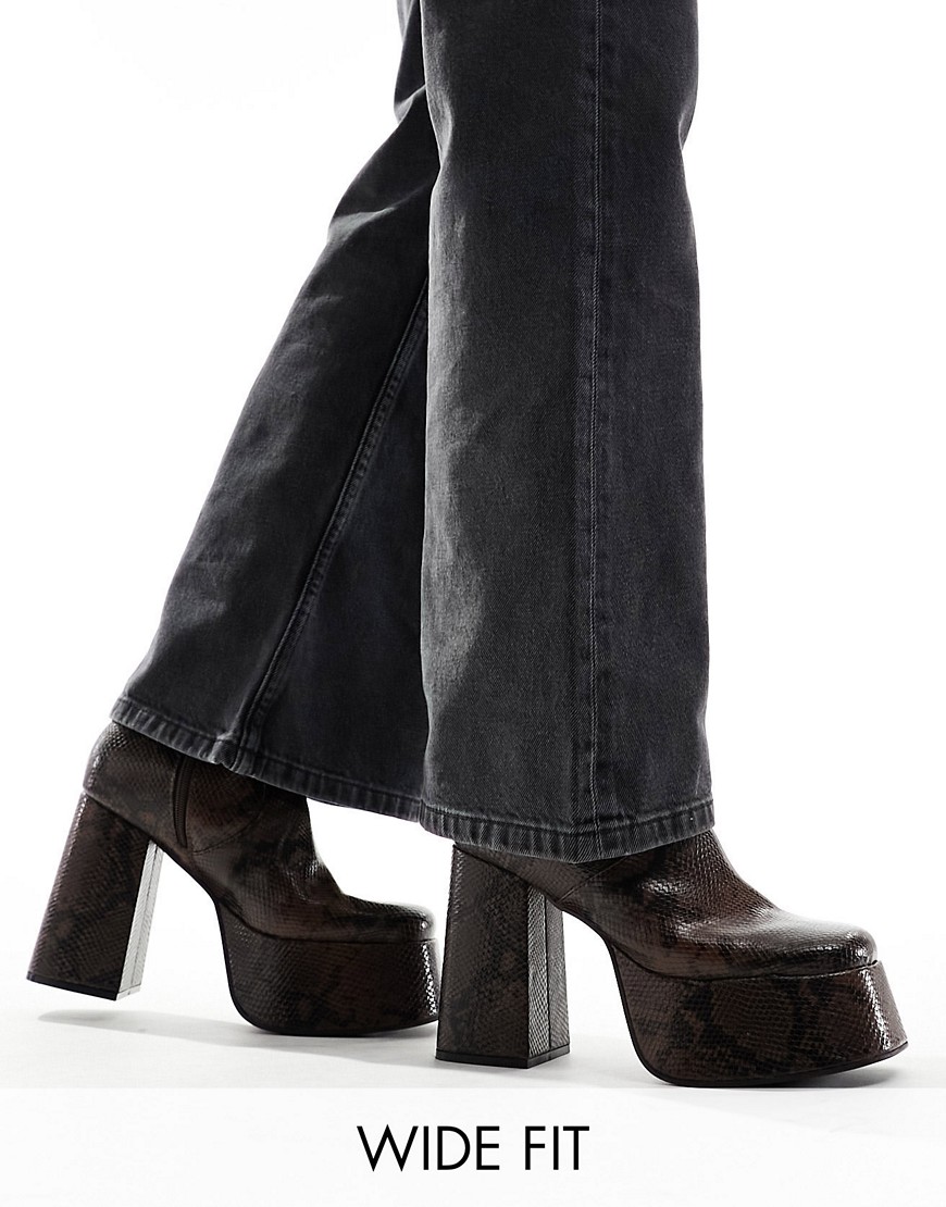 ASOS DESIGN knee high platform heeled boots in snake print faux leather-Brown