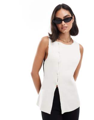 knit asymmetric vest in color block in black and white-Multi