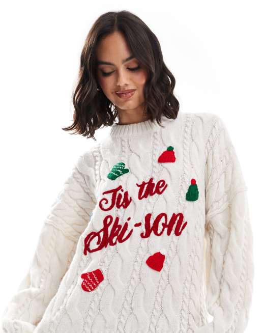 ASOS DESIGN knit cable Christmas sweater with slogan in cream