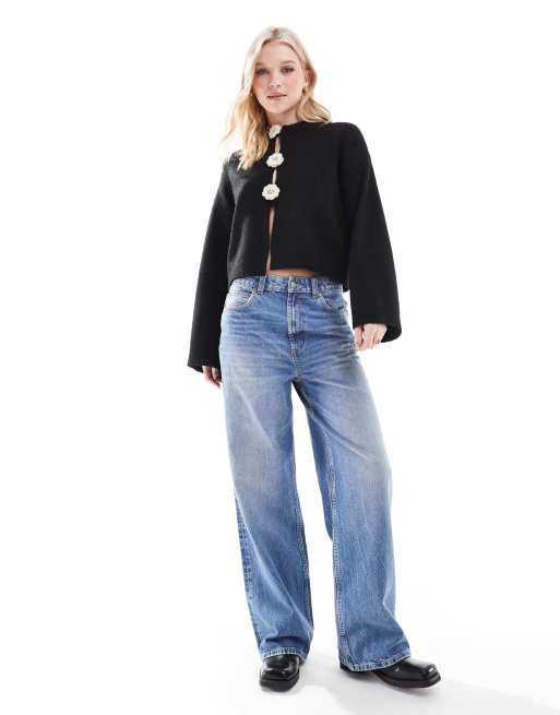 ASOS DESIGN knit cardigan with contrast flower corsages in black