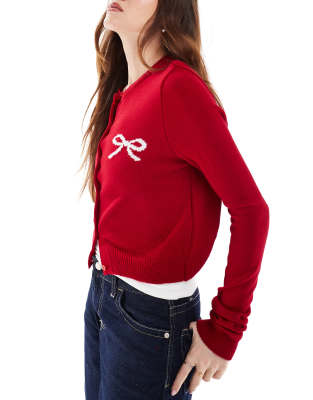 knit crew neck cardigan with bow logo detail in red