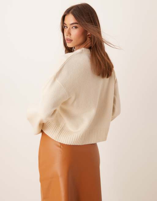 ASOS DESIGN knit crew neck cardigan with contrast black buttons in cream, 3 of 4