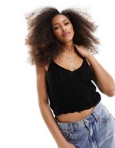 ASOS DESIGN knitted scoop neck crop tank top in distressed stitch in black