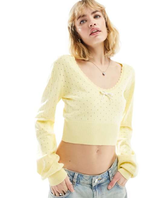 ASOS DESIGN knit long sleeve top in pointelle stitch with contrast bow detail in lemon