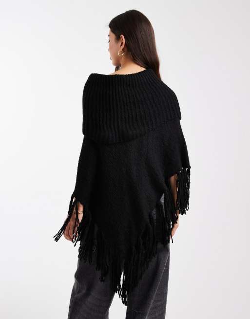 ASOS DESIGN knitted poncho with tassel fringe in black
