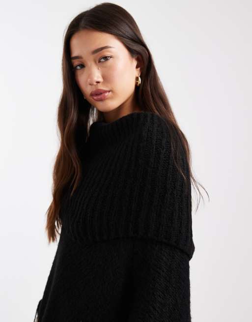 ASOS DESIGN knitted poncho with tassel fringe in black