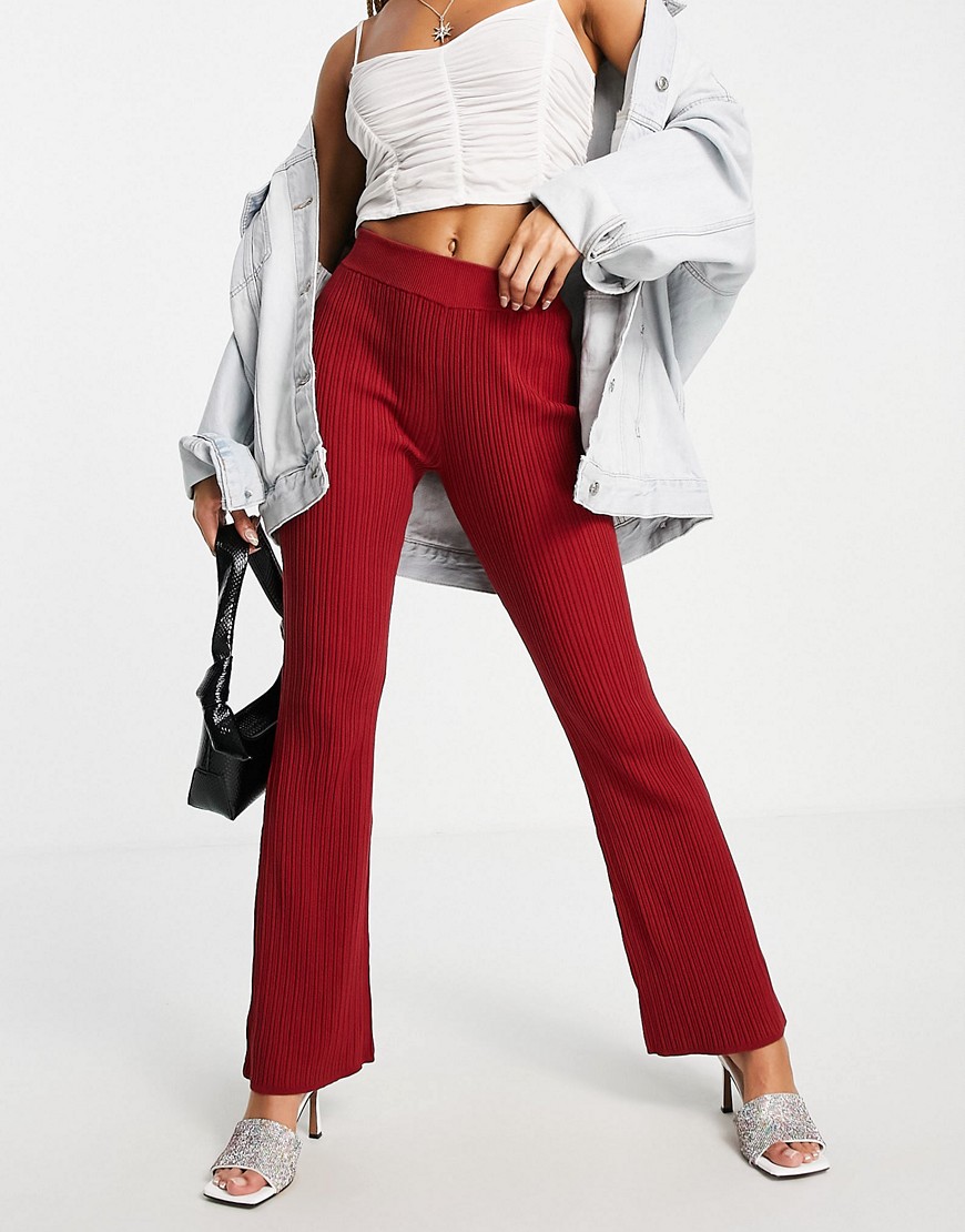 ASOS DESIGN knit ribbed flare pants in dark red - part of a set