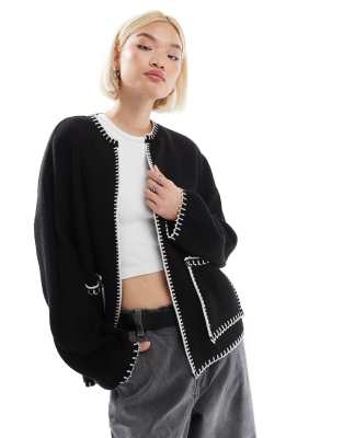 knit shacket with blanket stitch detail in black