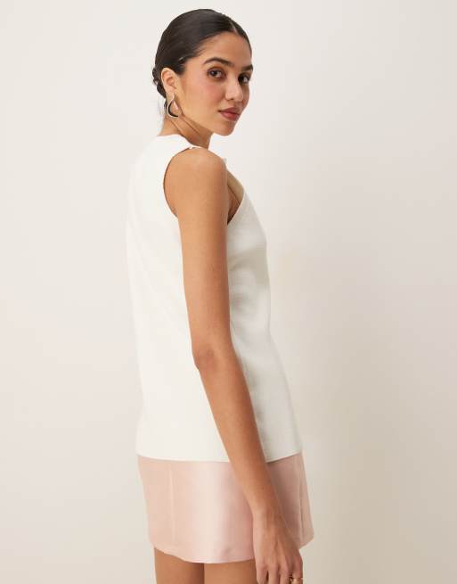 ASOS DESIGN knitted crew neck waistcoat with front split in white