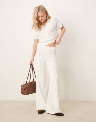 knit structured wide leg pants with seam front detail in cream-White