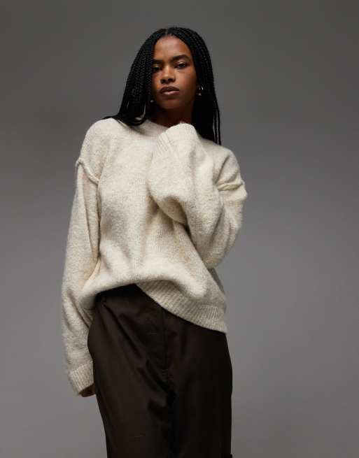 ASOS DESIGN knit sweater with exposed seams with wool in cream