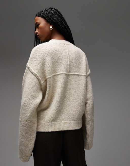 ASOS DESIGN knit sweater with exposed seams with wool in cream
