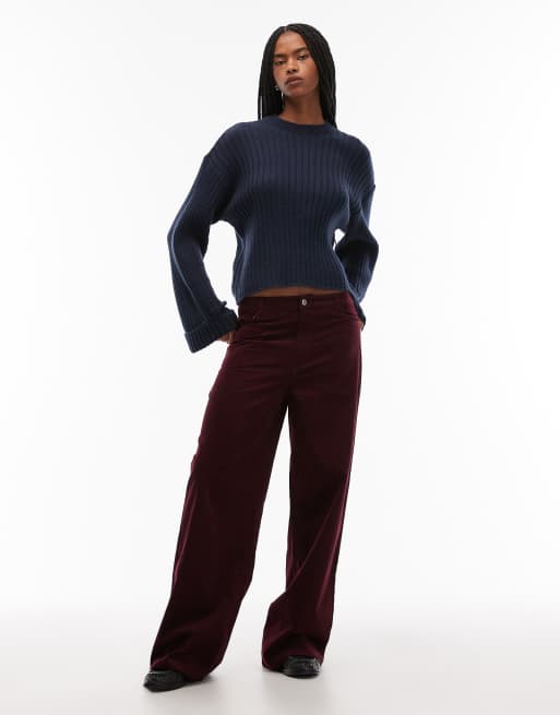 ASOS DESIGN knit sweater with rolled up cuffs in navy