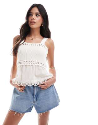 knit top with woven hem in cream-White