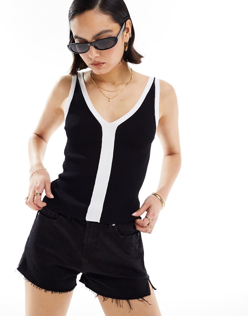 knit v neck tank top in black with contrast white trim