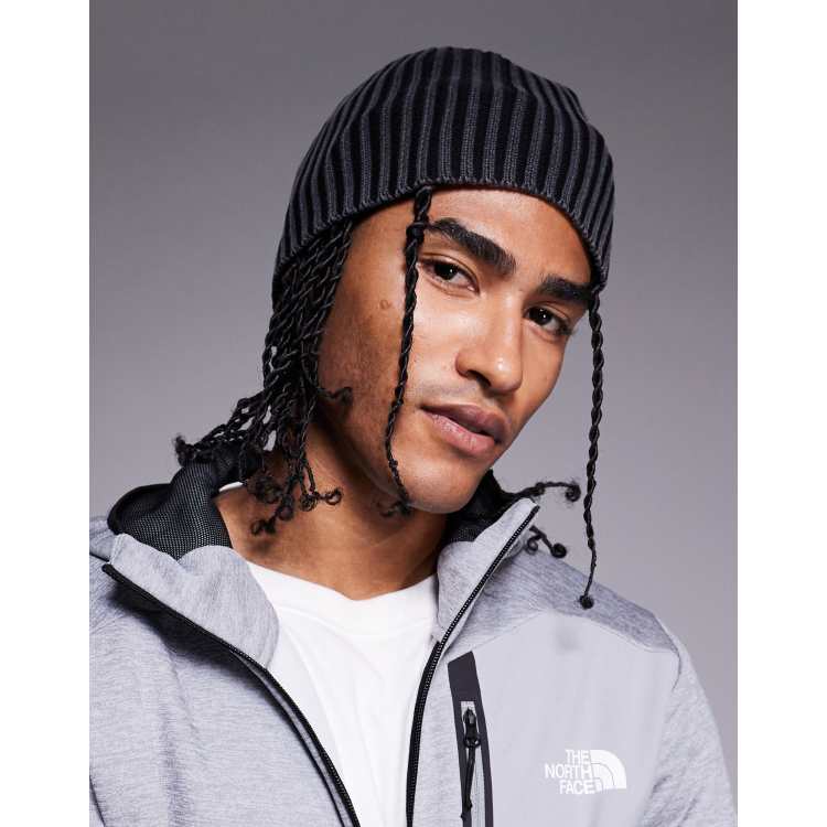 ASOS DESIGN knitted acid wash rib skull beanie in black | ASOS