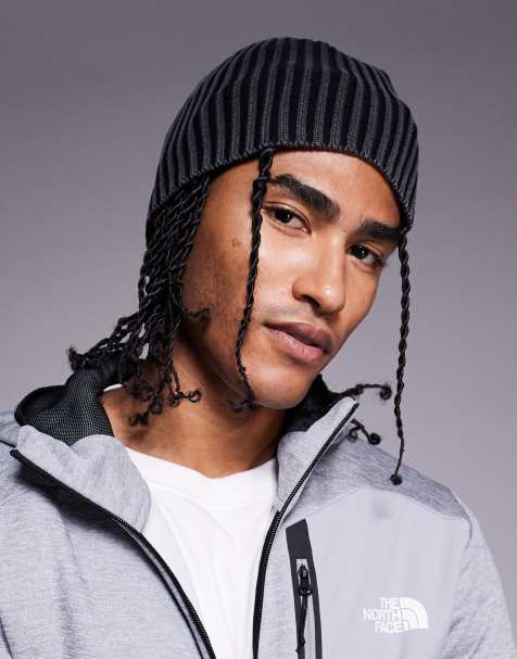 ASOS DESIGN knitted acid wash ribbed skull beanie in black - view 1