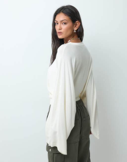 ASOS DESIGN knitted batwing waisted long sleeve top in cream, 4 of 5