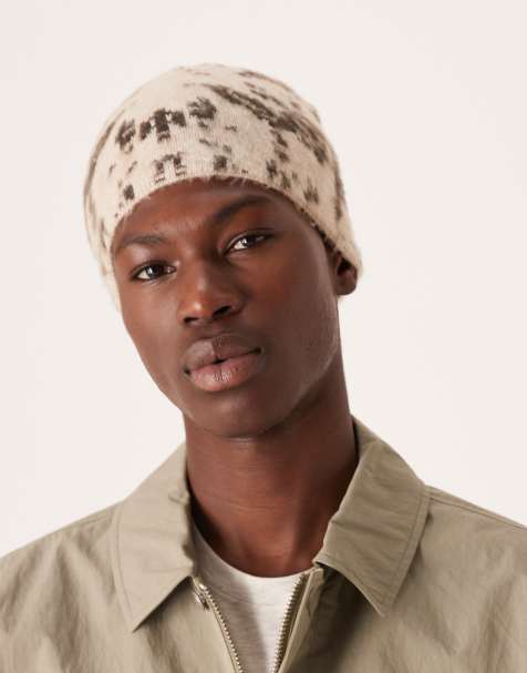 ASOS DESIGN knitted brushed cow print beanie in stone - view 1
