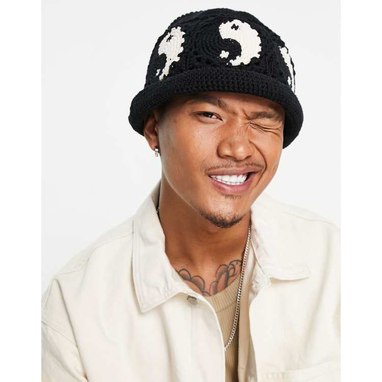ASOS DESIGN knitted bucket hat in black and white with yin yang | ASOS