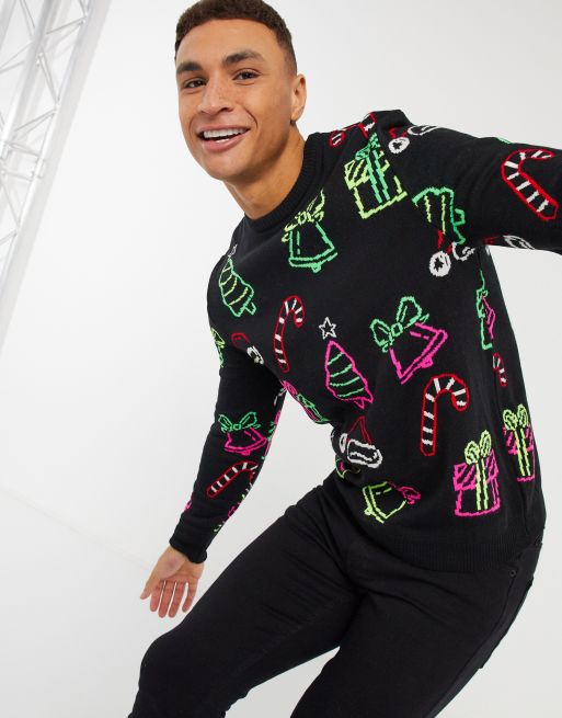 ASOS DESIGN knitted christmas jumper with all over neon motifs