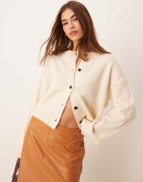 ASOS DESIGN knitted crew neck cardigan with contrast black buttons in cream - view 1