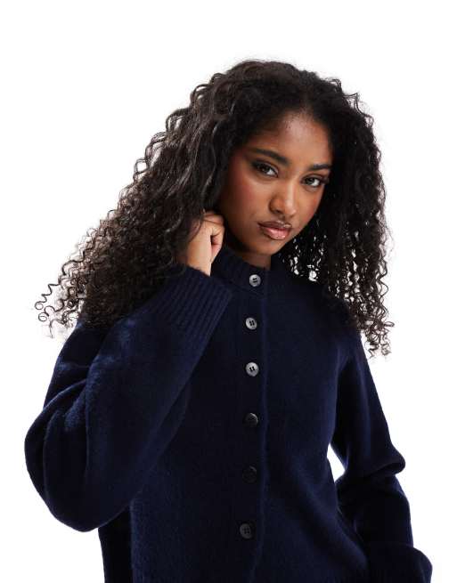 ASOS DESIGN knitted crew neck cardigan with contrast buttons and split hem in navy