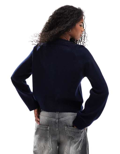 ASOS DESIGN knitted crew neck cardigan with contrast buttons and split hem in navy