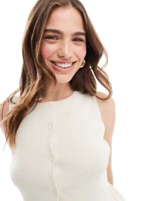 ASOS DESIGN knitted crew neck cropped vest in ivory | ASOS