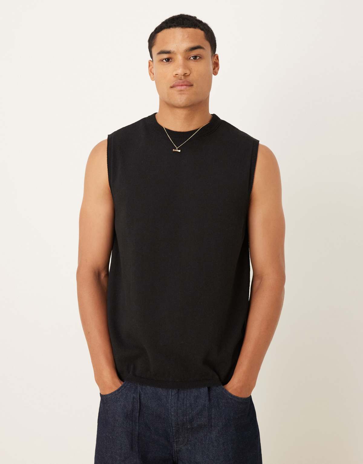 ASOS DESIGN knitted crew neck vest in black