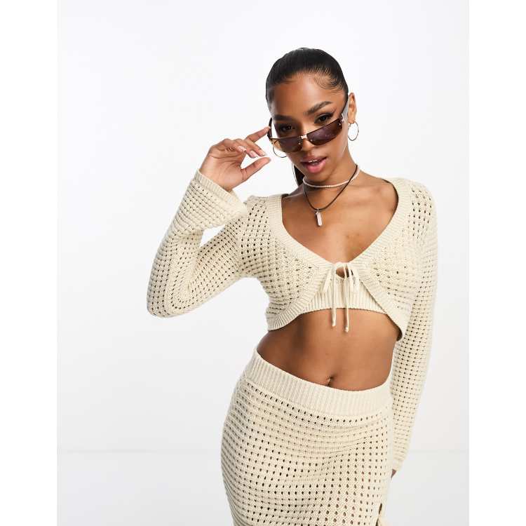 ASOS DESIGN cropped long sleeve crochet top with peplum hem in