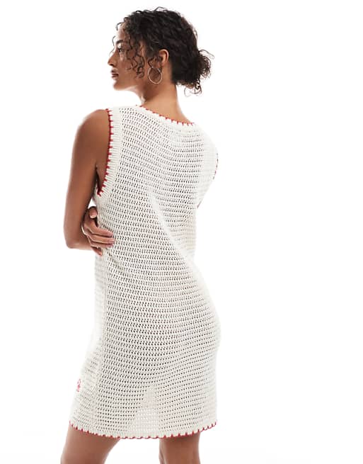 ASOS DESIGN knitted crochet mini dress with flower ASOS DESIGN knitted crochet mini dress with flower