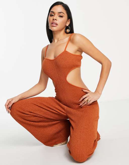 ASOS DESIGN knitted festival jumpsuit with cut out details in brown | ASOS