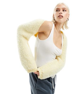 ASOS DESIGN knitted fluffy shrug in textured yarn in butter yellow