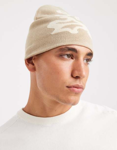 ASOS DESIGN knitted graffiti graphic skull beanie in neutral - view 1