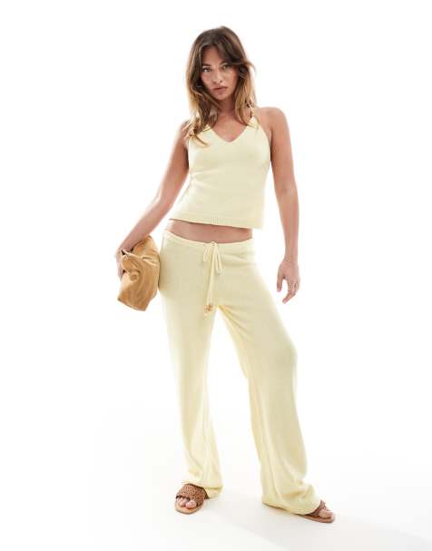 ASOS DESIGN knitted halter top and trouser co-ord with bead detail in buttermilk yellow - view 1