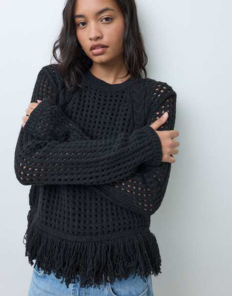 ASOS DESIGN knitted jumper with cable knit detail and fringe hem in black - view 1