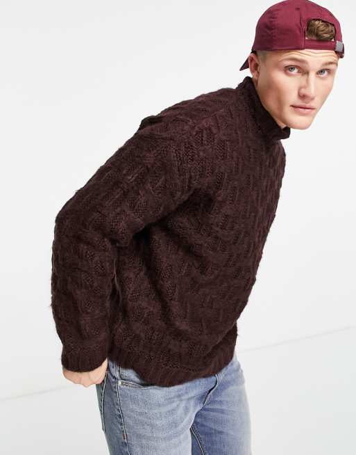ASOS DESIGN knitted large scale textured turtle neck jumper in pink