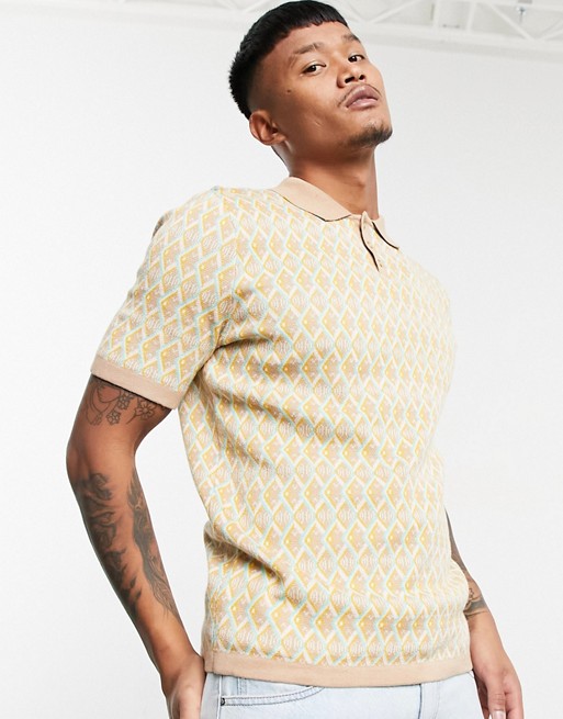 ASOS DESIGN knitted muscle fit polo with geo pattern