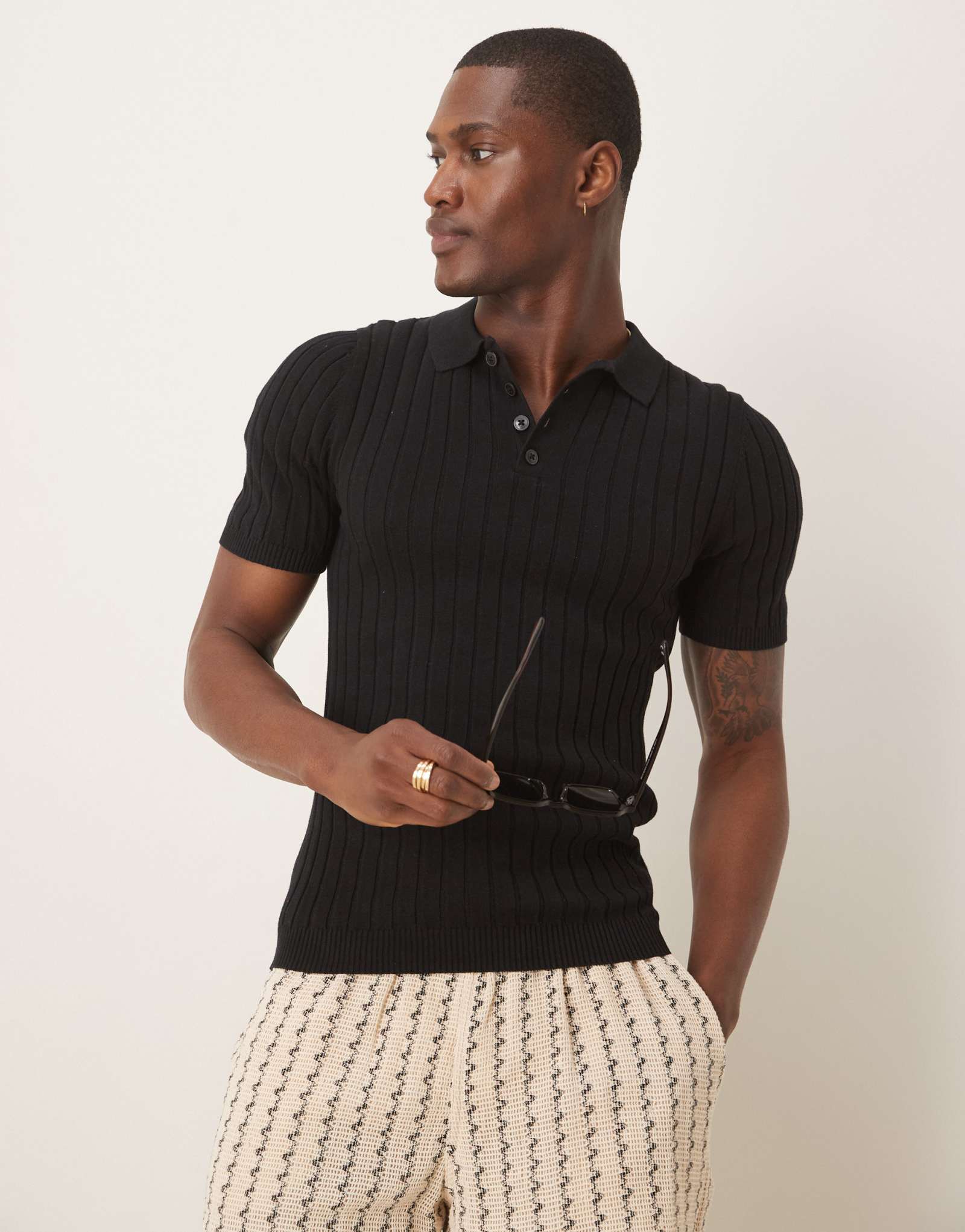 Дизайнерская трикотажная футболка-поло muscle fit rib от ASOS черного цвета
