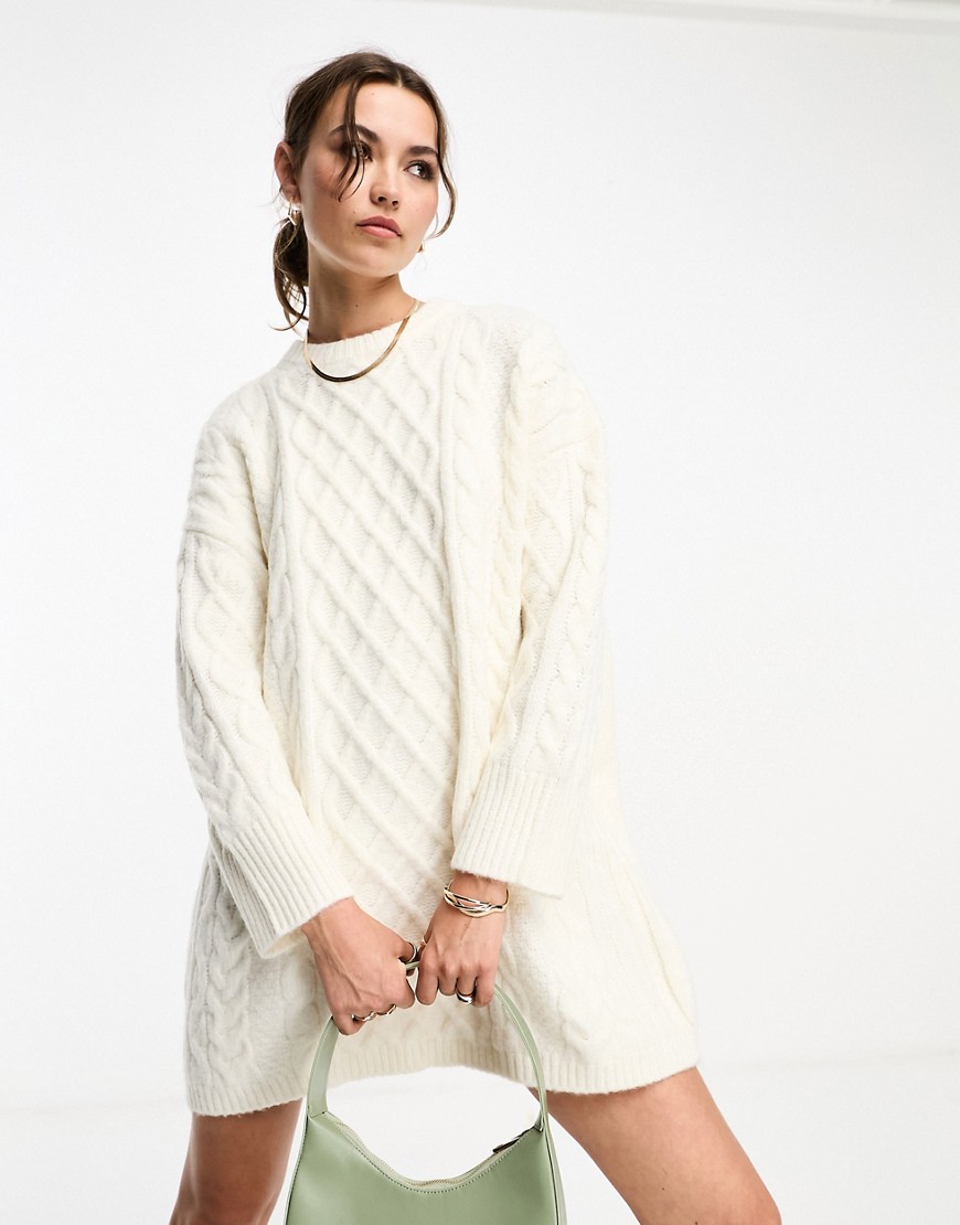 ASOS DESIGN knitted oversized cable mini jumper dress in cream-White