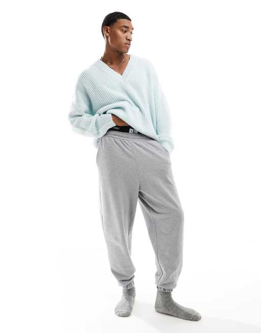 ASOS DESIGN knitted relaxed fisherman rib sweater with V-neck in blue, 6 of 7