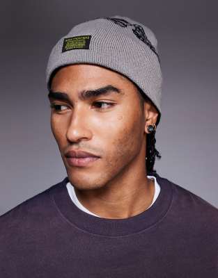 ASOS DESIGN knitted reversible skeleton graphic skull beanie in grey and black-Green