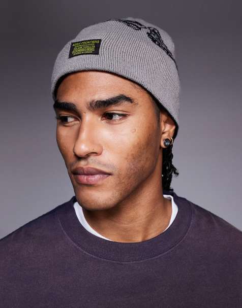 ASOS DESIGN knitted reversible skeleton graphic skull beanie in grey and black - view 1