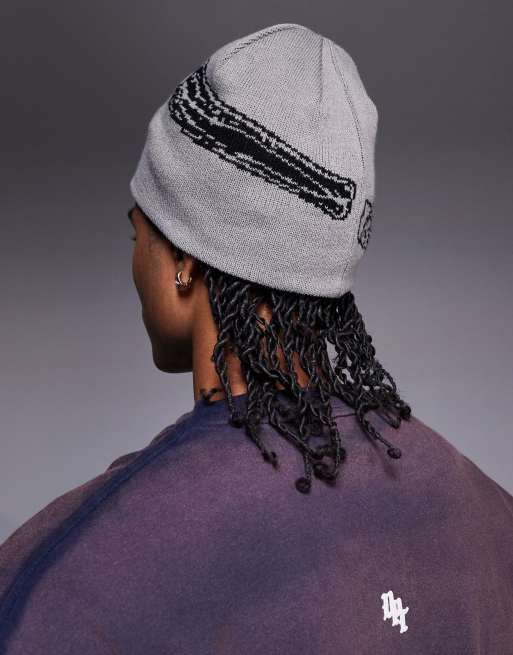ASOS DESIGN knitted reversible skeleton graphic skull beanie in grey and black, 3 of 3
