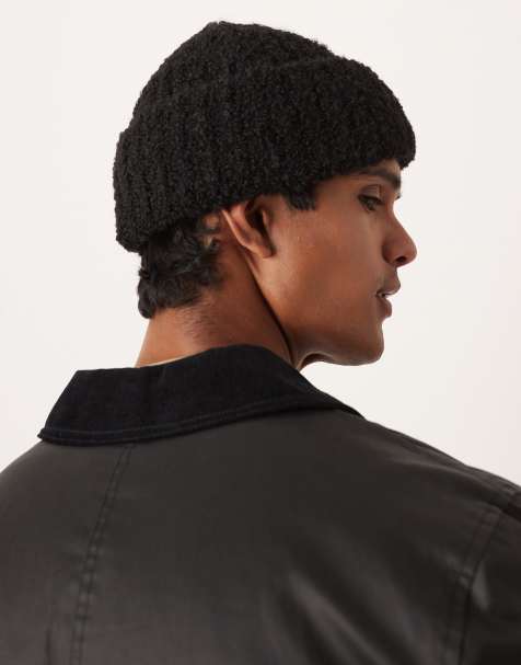 ASOS DESIGN knitted rib boucle beanie in black - view 2