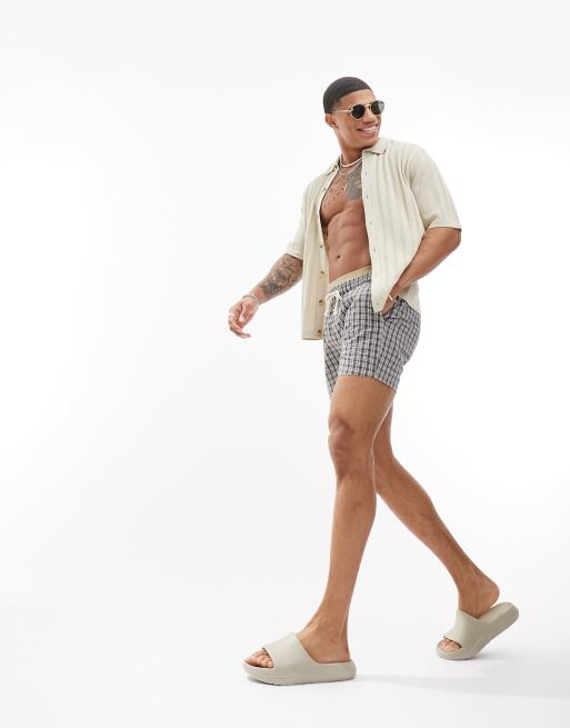 ASOS DESIGN knitted rib button through polo in stone | ASOS
