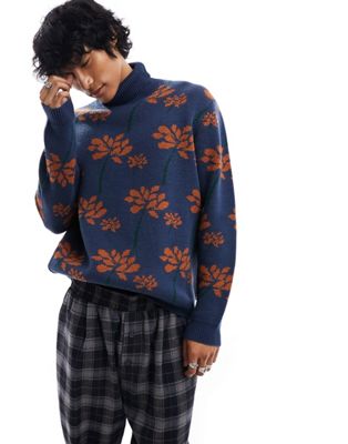 ASOS DESIGN knitted roll neck jumper with floral pattern in navy