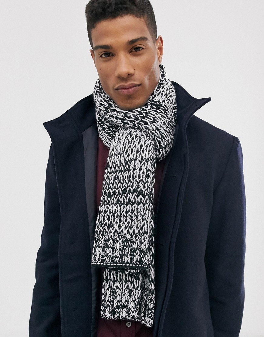 ASOS DESIGN knitted scarf in black and white twist